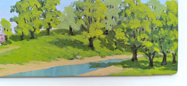 Detail image of a mini oil painting showwing grass, trees and a stream, by Phil Fake